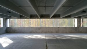 Interior of Crocker Park parking garage with view of reverse side of textile facade cladding